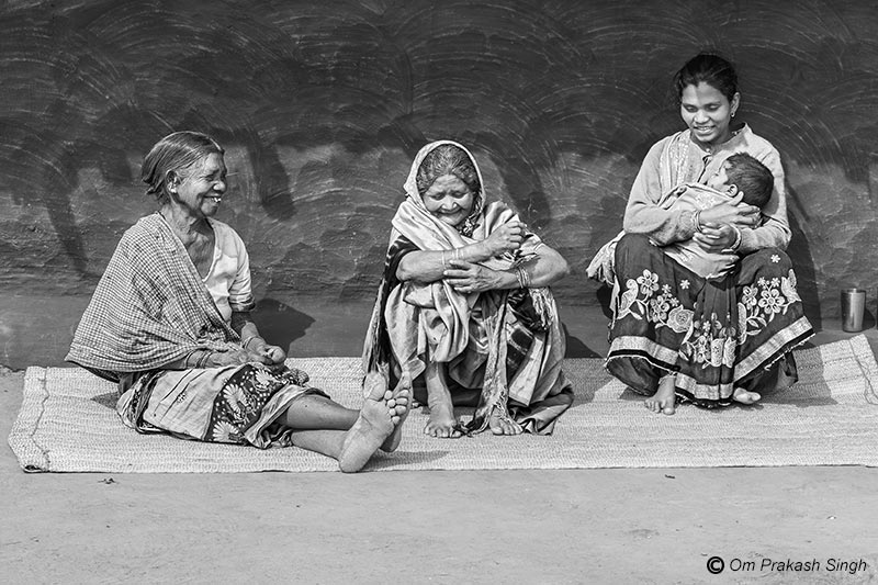 Women in a JJM-benefited neighborhood enjoying leisure time together in Latehar district, Jharkhand, India
